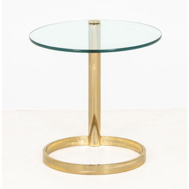 Modern Circular Glass Top Brass Coffee Table. 20.5" H x 20" Diameter. Provenance: From a Long Island, New York Estate.