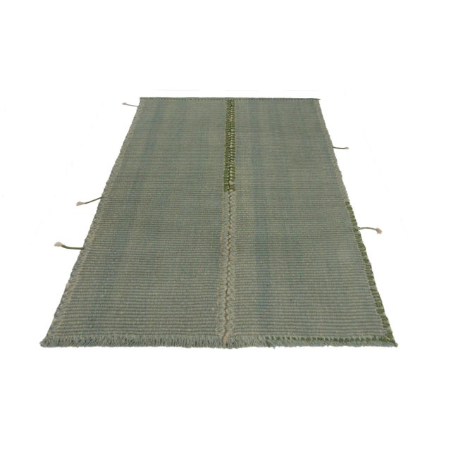 Handwoven in wool, a gift-sized 3x4 Kilim from an innovative new contemporary flat weave collection by Rug & Kilim. On the...