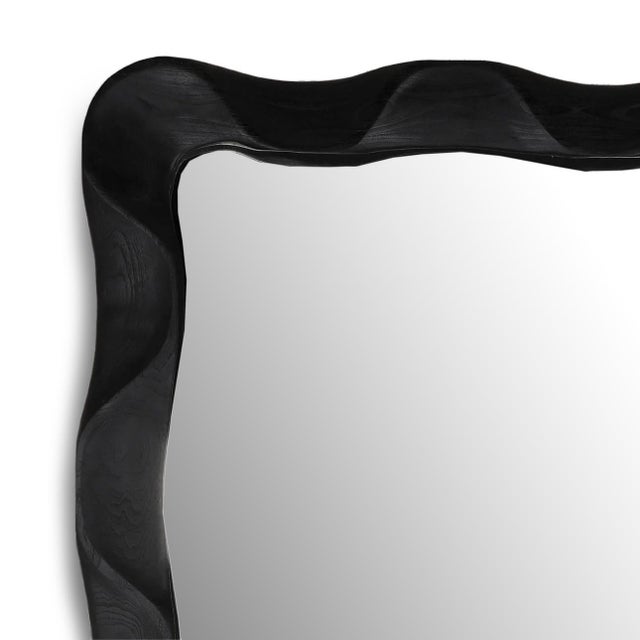 Fun wave design teak wood full length mirror with matte black finish. Carved with beautiful flowing subtle dimension. Each...
