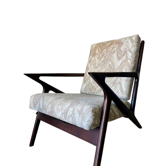 A beautiful pair of Mid-Century Modern Poul Jensen-inspired "Z" chairs, available in a walnut finish and newly...