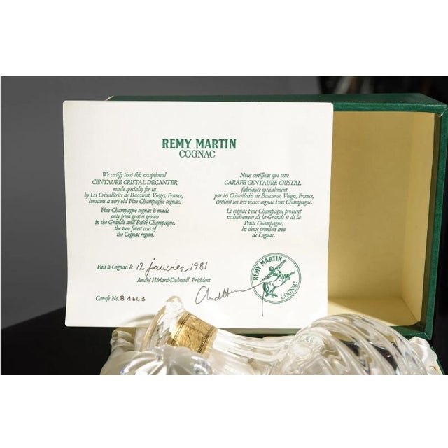 A collectible original Rémy Martin Cognac decanter dating to circa 1981, complete with its original presentation box and...