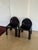 Pair of Model 4854 chairs designed by Gae Aulenti for Kartell, 1970s. Constructed from molded ABS plastic with a high...