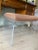 Outstanding vintage waterfall lucite bench or vanity stool that swivels. It has an upholstered cushion with a zipper....