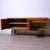 Beautiful sideboard, Italian design and production circa 1960s. Composed of two doors with decorated white glass, inside...
