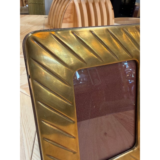 Elegant vintage Italian picture frame by Arabesque Gioielli Palermo, dating to the late 20th century. Crafted in brass,...