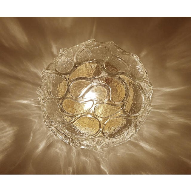 Pair of mid century sconces with stormy wave relief glass shades, bronze enameled bases Dimensions Diameter : 10.23 in....