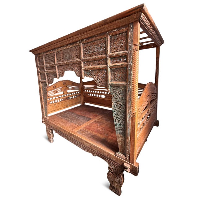Beautiful antique Balinese canopy daybed. Wonderful unique piece for outdoor or indoor use. Seat height is 22". Mattress...