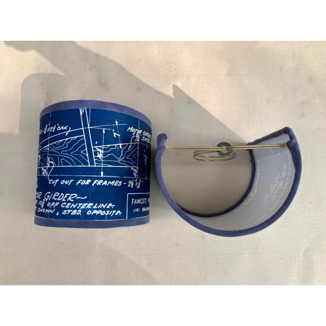 A pair of clip top sconce shades hand made from a set of vintage blueprint drawings of a ship. A perfect accent for a...