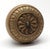 Gothic style concentric knob with egg & dart trim and floral center details. Made by Chicago Hardware in the 1905 catalog....