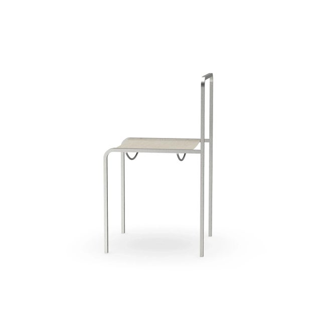 MENTON chair is hand-crafted in stainless steel and is made for in- and outdoor use. The seat is made of canvas from...