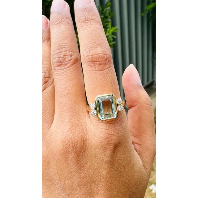 Aquamarine and Diamond Cocktail Ring in 18K Gold featuring natural aquamarine of 5.45 carats. The gorgeous handcrafted...