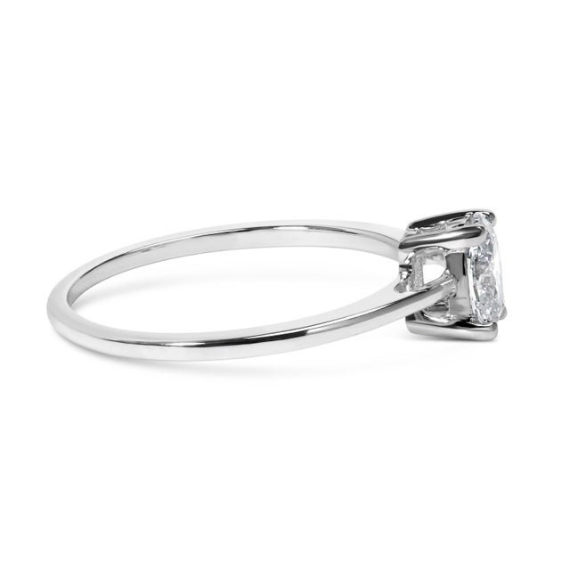 Celebrate your commitment with this magnificent 14K white gold engagement ring, where timeless elegance meets modern...