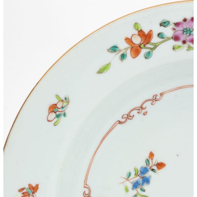 Pair of Chinese Export Famille Rose Porcelain Soup Bowls, hand-enameled with flowers and butterflies. 9" Diameter x 1.75"...