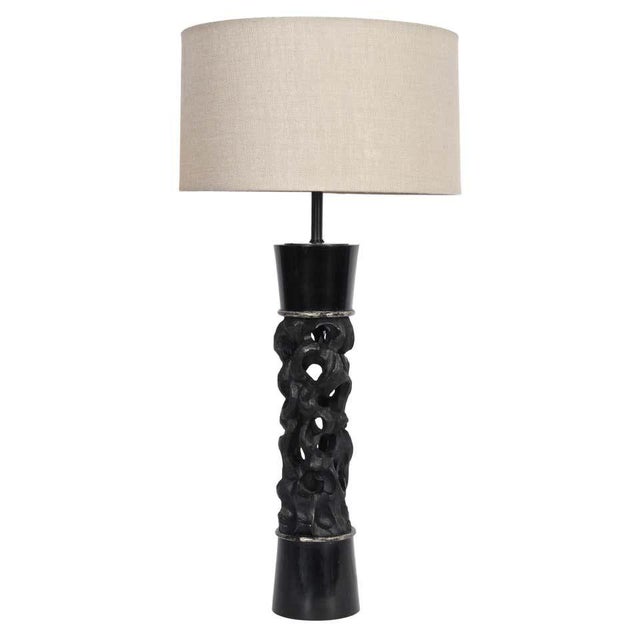 Majestic Hollywood Regency carved black wood with silvered details by James Mont. Featuring a handcrafted slender and...