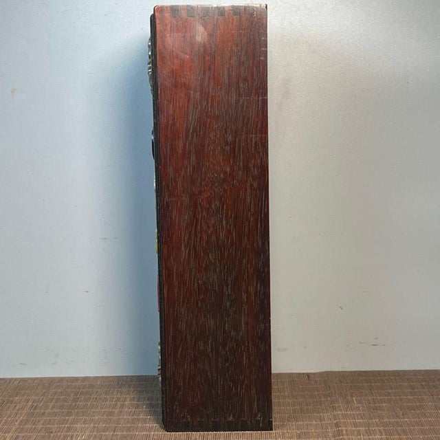 This striking vintage wooden box is a beautiful example of traditional Chinese craftsmanship. Crafted from ebonized wood...
