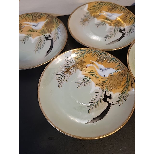 Beautiful set of 5 Japanese porcelain saucers/small plates. These pieces were handpainted and produced around the 1940' or...