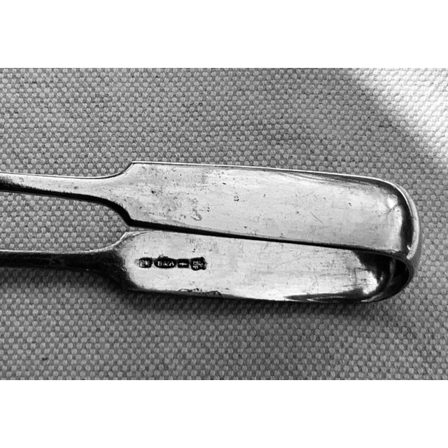 ….Hallmarked Pair | Circa 1890 An exceptional pair of large serving tongs from the golden age of English Sheffield silver...