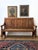 A fabulously unique panelled 18th century hallway bench. This has been loved over the years, with the wood on the arm...