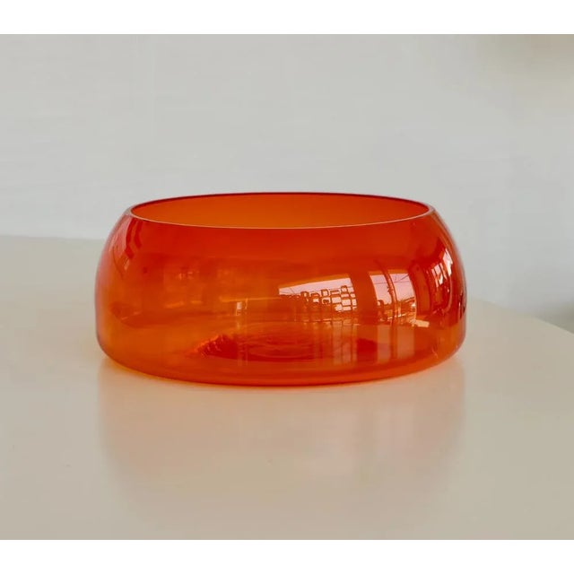A large orange Murano glass bowl. Maison Salviati created in 1859 in Murano. Italy 90s. This piece has an attribution...