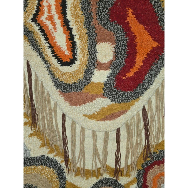 Beautiful handmade tapestry or Wall rug from the 1970’s warm orange/rust/brown tones and elegant composition rolled on top...
