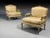 A pair of Louis XV style lounge chairs by Maison Jansen in their original fabric. A finely carved pair of chairs having a...