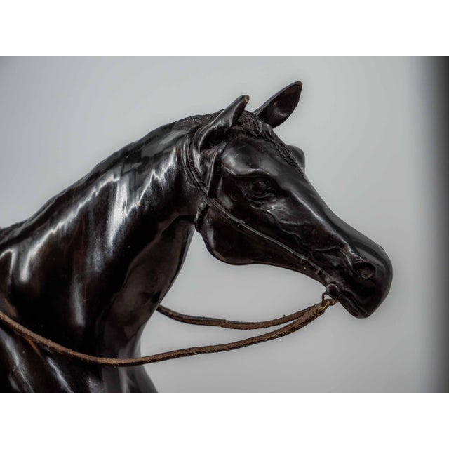 A beautiful, large sculpture of a jockey on horseback. Detailed execution. The sculpture is signed on the base. It was...