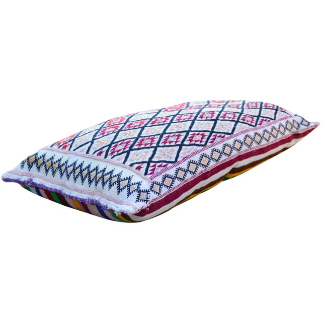 One-of-a-kind Moroccan lumbar pillow handwoven by the Berber tribe of the High Atlas Mountains. Features an intricate...