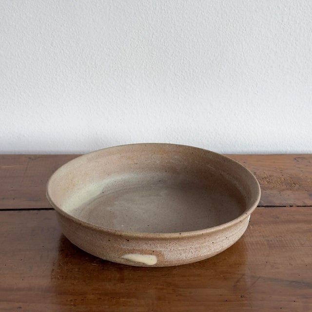 Handmade clay stoneware serving dish. Speckled earthtones of gray and brown. Rustic, textured. Dimensions 9" diameter at...