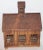 Early 19th C cast iron miniature farm house. Rust surface patina. From New England.