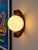 Two wall sconces, each with a mahogany wood base and two frosted opaline glass shades. 1970s. in excellent condition – no...
