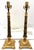 Timeless pair of Hollywood Regency style candlestick lamps from the late 20th century. They're made of a composite...