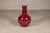 This vintage Chinese porcelain vase showcases the rich, saturated oxblood glaze that has long been admired by collectors...