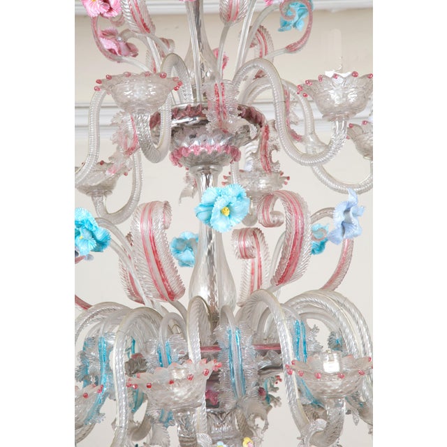 Late 18th Century Eighteen-Light Ca’ Rezzonico Chandelier This Eighteen-Light Ca’ Rezzonico Chandelier, crafted in pink...