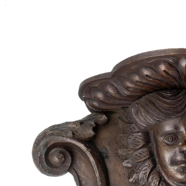 Sacred Art - Corbel - 19th Century. Portuguese; 19th/20th century, carved chestnut wood. Traces of treated woodworms....