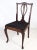 Mahogany dining chairs with nice cutting in the backrest with black patterned fabric from about the 1920s. Dimensions in...