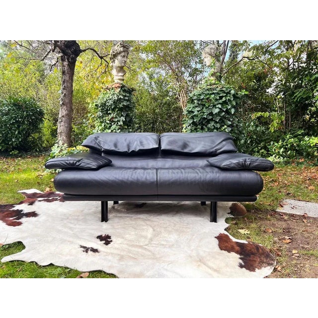 Paolo piva alanda a rectangular two-seater sofa with mobile headrests and armrests covered with its multicolored original...