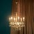 Chandelier 8 lights.Designed by Gaetano Sciolari, around the 70s.Brass frame and Murano glass pendants.Excellent condition...