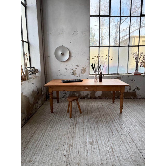 Antique 1950s farmhouse table in solid cherry wood. we particularly love its proportions and its ideal length for...