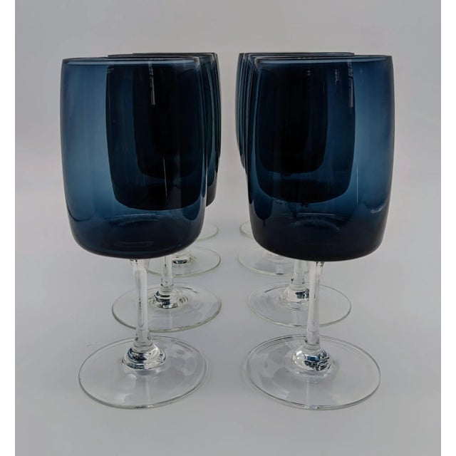 Made in Germany, this is a set of eight (8) mid 20th Century Gorham Reizart smoke-blue goblets (for wine, water, etc.)...