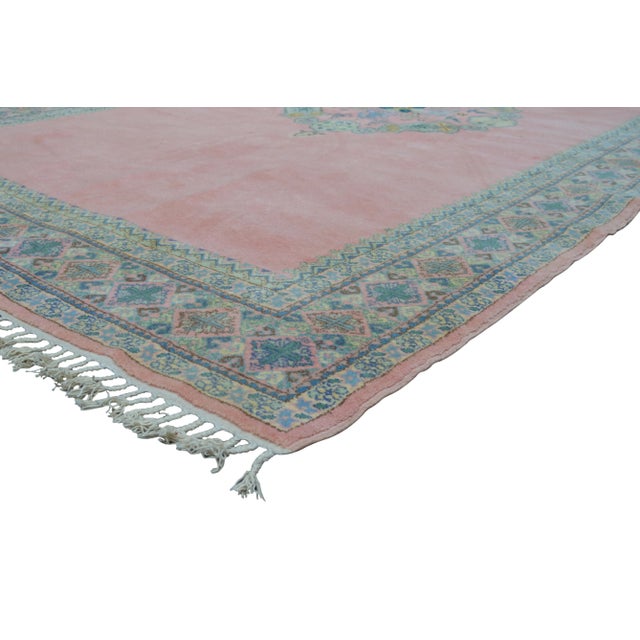 One-of-a-kind Moroccan vintage rug, hand-knotted with a low wool pile. Featuring an intricate floral medallions in natural...
