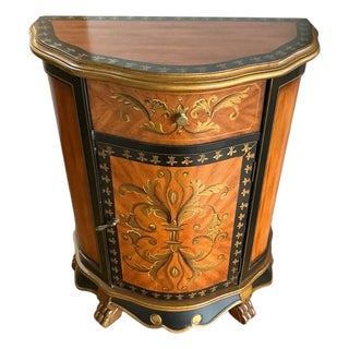French-Inspired Reproduction Demilune Cabinet With Gold Fleur-De-Lis Motif For Sale