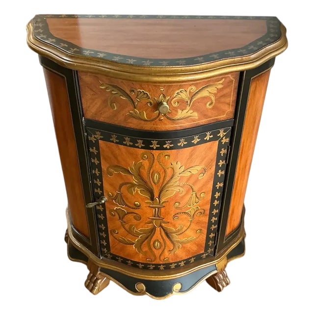 French-Inspired Reproduction Demilune Cabinet With Gold Fleur-De-Lis Motif For Sale