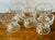 This is a set of five charming vintage dessert bowls featuring a ribbed or optic pattern on their side with a footed base....