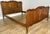 An elegant Vintage French Louis double bed in oak, featuring beautifully shaped head and footboards, decorative panelled...