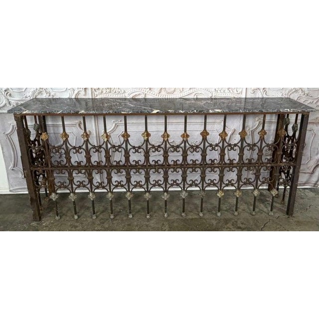 An extraordinary and exceptionally rare pair of architectural salvage console tables, masterfully crafted from 19th-...