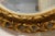 1920s Carved Bevelled Gilt Round Wall Mirror, 1920 For Sale - Image 5 of 6