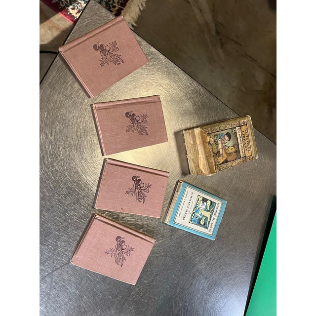 Up for consideration is a beautiful vintage collection of miniature children's books. These would look lovely as nursery...