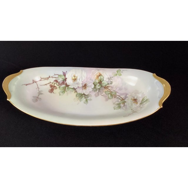 Tressemann & Vogt - Limoges hand painted white roses on a porcelain oval platter Trimmed with gold Oval in shape with the...