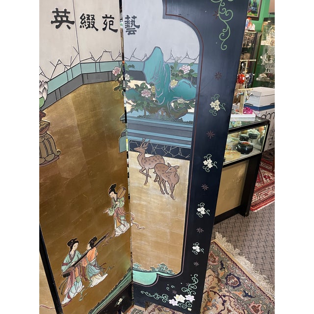 This Chinese Coromandel Screen is a vintage piece that comes with 6 panels. The primary material used in constructing this...