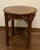 Late 20th C table has a central pullout drawer decorated with traditional brass batwing style pulls. The legs are straight...